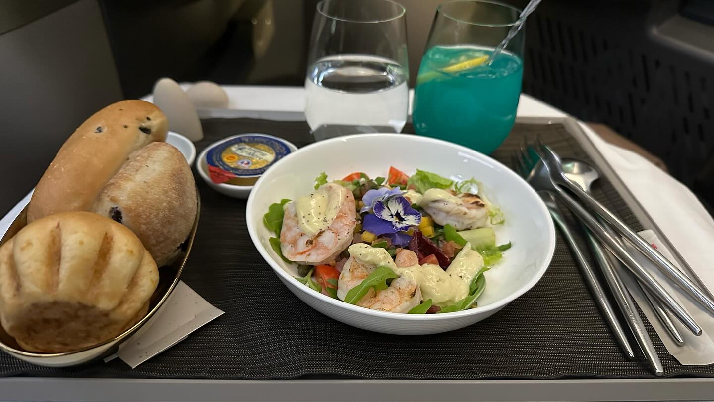 Enjoying a great meal 10364m above sea level 42.21667° N, 125.75000° W on @starluxairlines (2)